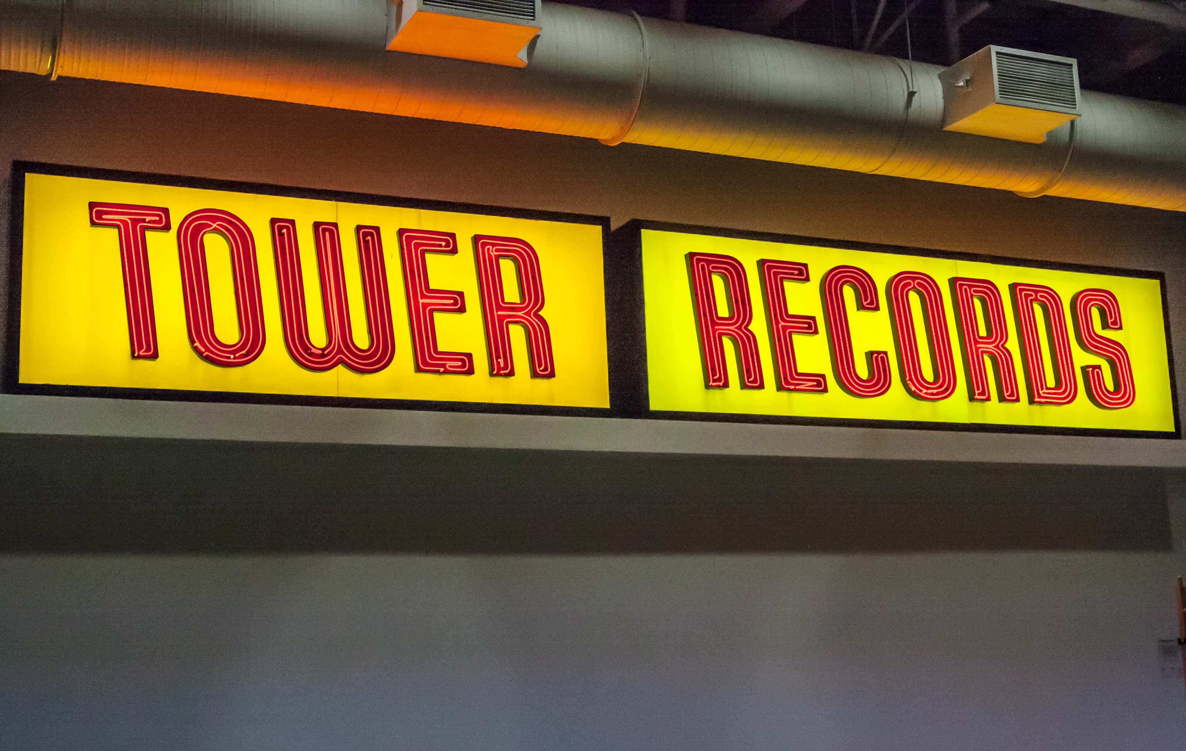 The original signage of Tower Records now hangs in the concourse of The Golden 1 Center, home of the Sacramento Kings.