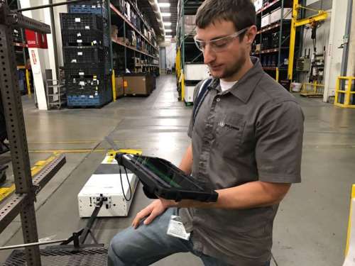 Matt Younger, a Project Engineer at Polaris, shows how the delivery bots work.