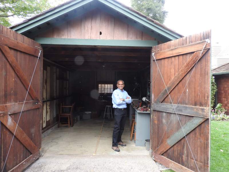 Chandrakant Patel is an HP senior fellow and chief engineer. He is standing at HP's original garage headquarters.