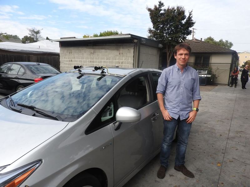 Laszlo Kishonti, CEO of AImotive, shows off the company's test car in Mountain View, Calif.