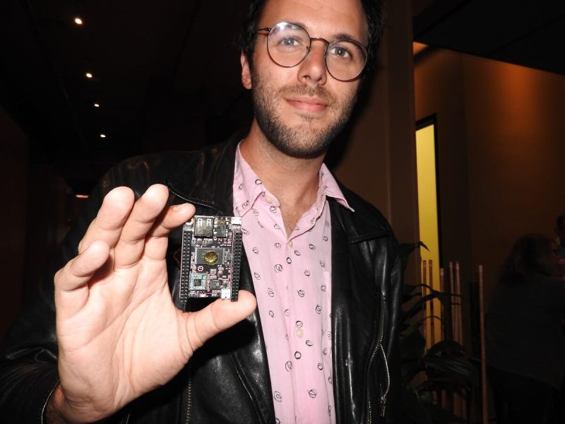 Dave Rauchwerk, CEO of Next Thing Co., holds a $9 CHIP computer.