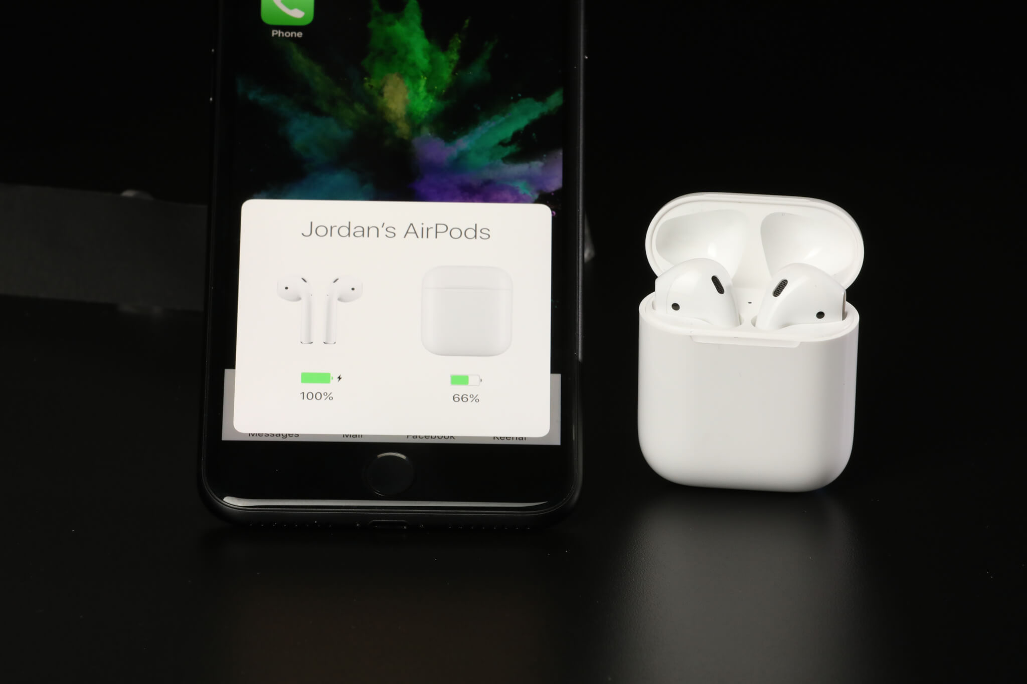 AirPods in case and the box that pops up when the case is nearby to show remaining battery life.