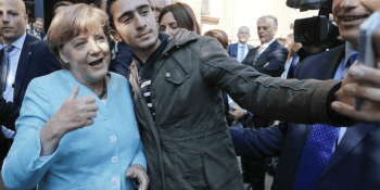 Syrian refugee sues Facebook for ‘defamatory’ posts after selfie with Angela Merkel