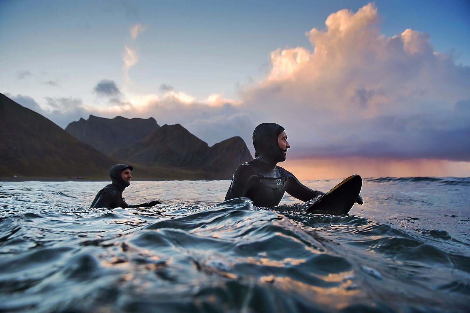 This photograph of surfers on 500px is an example of one selected for licensing through Adobe Stock.