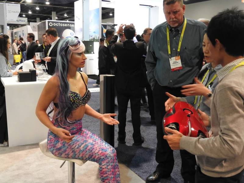 This mermaid was hawking PowerVision's underwater drone. 