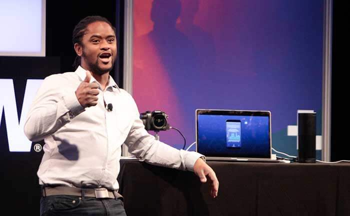 Jason May demos financial chatbot Finie made by his company Clinc. Image Credit: Intel Corporation.