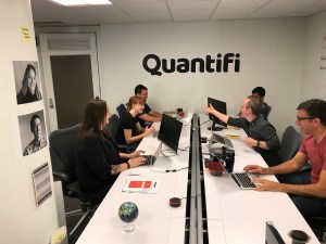 This photo shows workers at Quantifi, which provides AI-powered digital ad experimentation software and is based in Indianapolis, Indiana.