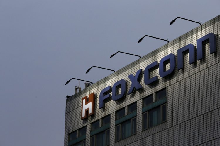 The logo of Foxconn, the trading name of Hon Hai Precision Industry, is seen on top of the company's headquarters in New Taipei City, Taiwan.