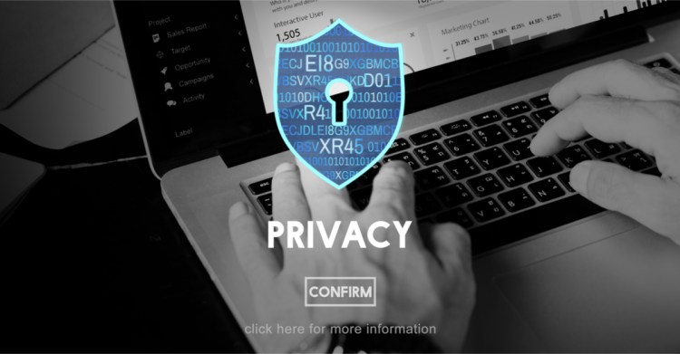 data privacy shielf with hands typing in background