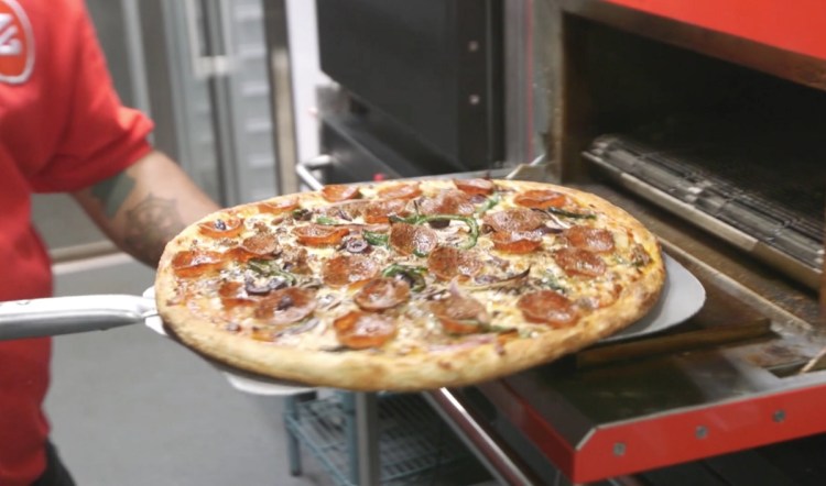 Zume makes pizza while delivering it to you.