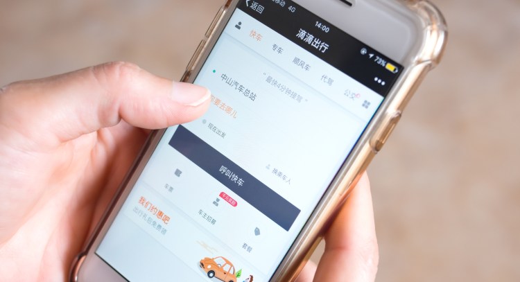 Zhongshan, China-April 8, 2018. Person booking a car on Didi ChuXing.