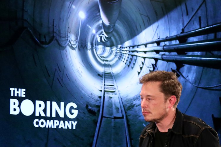 Elon Musk arrives to speak at Boring Company community meeting