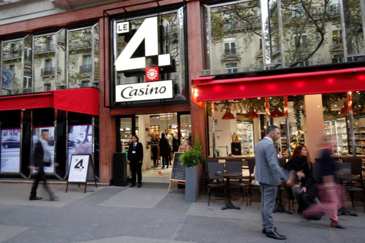 The logo "Le 4 Casino" is seen outside a high-tech store of supermarket retailer Casino in Paris, France, October 4, 2018.  