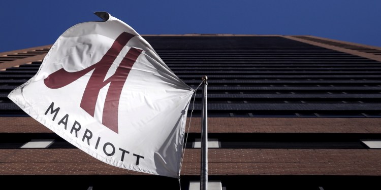 A Marriott flag hangs at the entrance of the New York Marriott Downtown hotel in Manhattan, New York