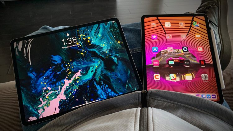 Apple's third-generation 12.9-inch iPad Pro (left) and new 11-inch iPad Pro.
