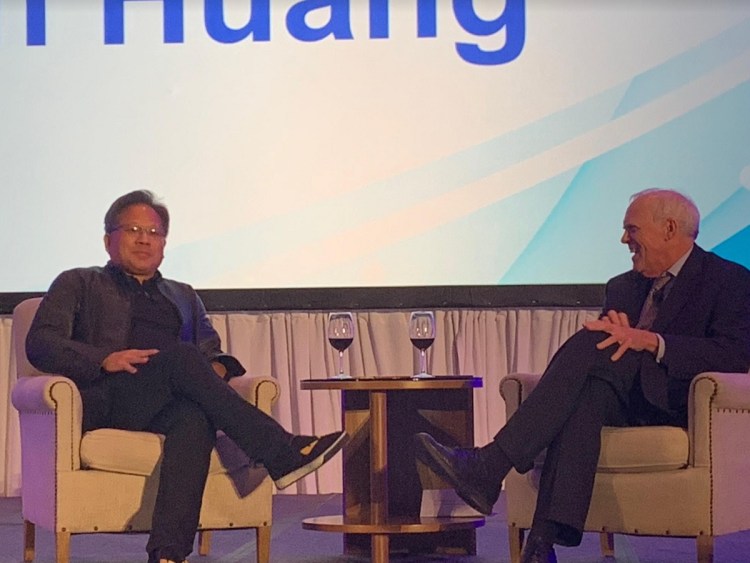 Jensen Huang (left), CEO of Nvidia, talks with former Stanford University president John Hennessy.