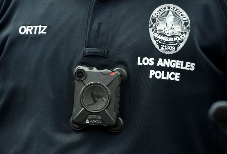 A Los Angeles Police Department officer wears a body camera at the Los Angeles Gay Pride Resist March, June 11, 2017 in Hollywood, California.