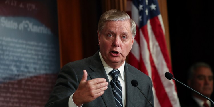 U.S. Senator Lindsey Graham holds a news conference to discuss his plans to introduce a Senate resolution condeming the Democratic-led U.S. House of Representatives impeachment inquiry into U.S. President Donald Trump as "illegitimate" at the U.S. Capitol in Washington