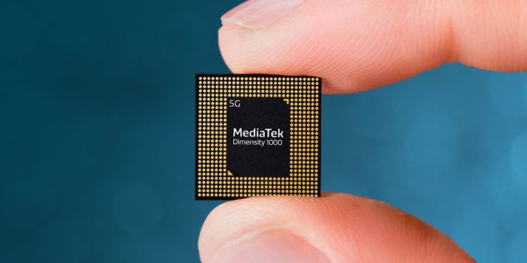 Hand holds MediaTek's Dimensity 1000 5G SoC between thumb and forefinger
