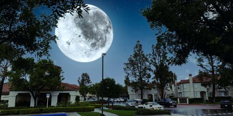 Live composite of supermoon over a neighborhood created by AI in Photoshop Camera