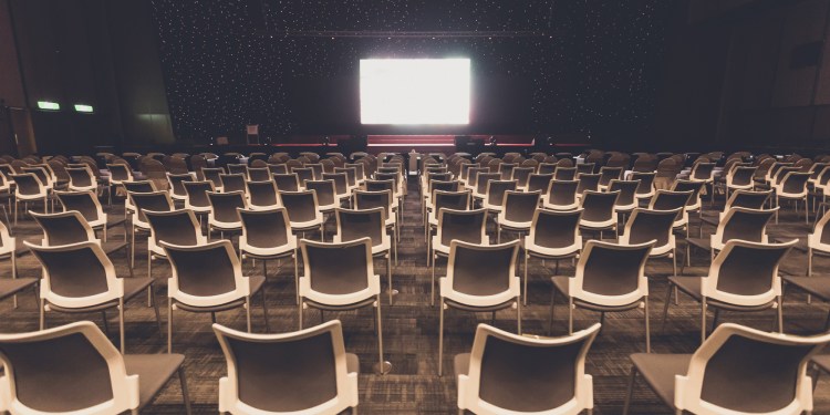Empty chairs for audience in the conference hall