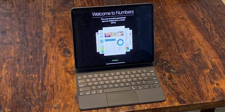 Is that a MacBook? No, it's an iPad Pro that converts into a laptop using Apple's new Magic Keyboard.