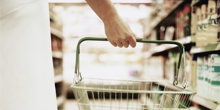 Woman Holding Empty Basket