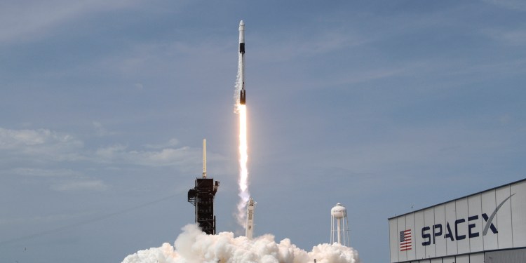 A SpaceX Falcon 9 rocket and Crew Dragon spacecraft carrying NASA astronauts Douglas Hurley and Robert Behnken lifts off during NASA's SpaceX Demo-2 mission