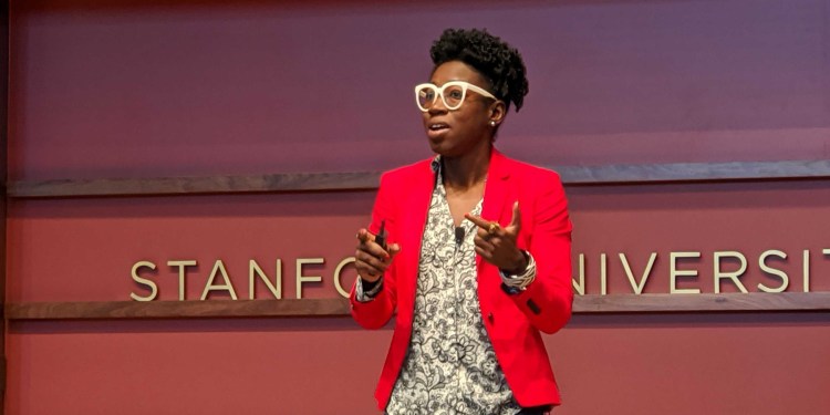 Algorithmic Justice League founder Joy Buolamwini discusses the Gender Shades project in a presentation at 