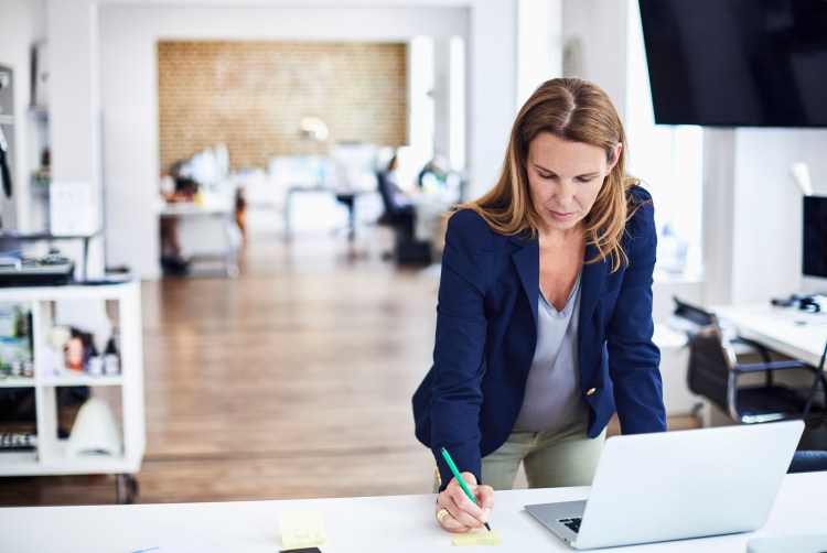 Businesswoman working at desk in office