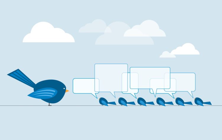 Row of bluebirds on phone line chatting, representing Twitter, chatting, chat, chatbots, chat AI