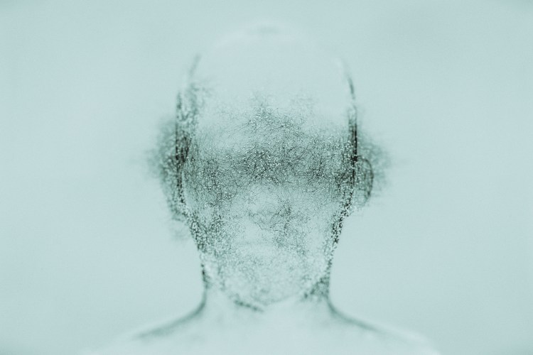 An unfinished sketch of a human head; only half done