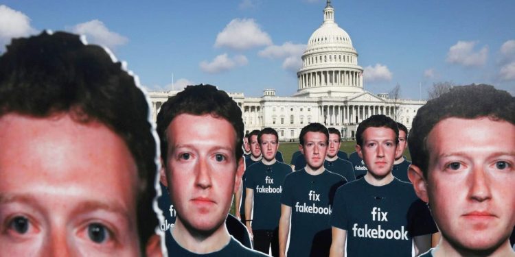 Dozens of cardboard cut-outs of Facebook CEO Mark Zuckerberg sit outside of the U.S. Capitol Building as part of an Avaaz.org protest in Washington, U.S., April 10, 2018.