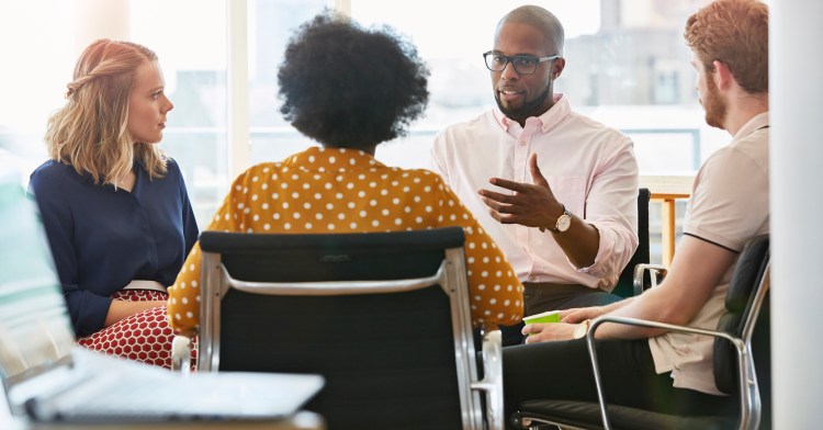Group of business people having a discussion