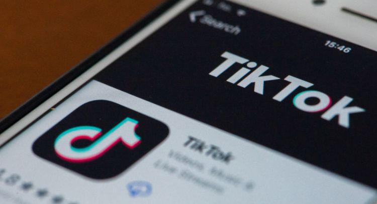 An user opening TikTok on his iPhone in L'Aquila, Italy, on January 23, 2021. The Privacy Guarantor has ordered the block for the TikTok users without ascertained age. (Photo illustration by Lorenzo Di Cola/NurPhoto)