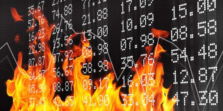 Fire burning up a wall of numbers