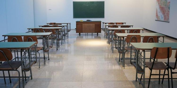 Classroom with desk and chalkboard