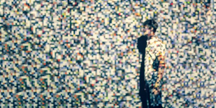 A person projected in pixels.