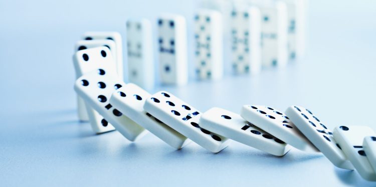 pile of dominoes falling