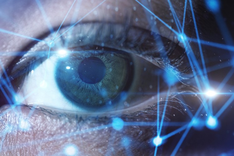 Woman's eye and closeup network connection.