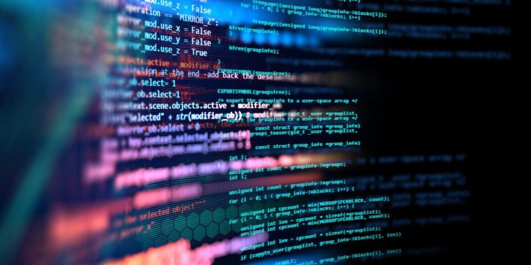 Image of software code against a neon background.