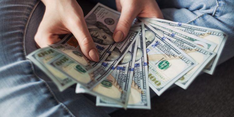 Person holding money