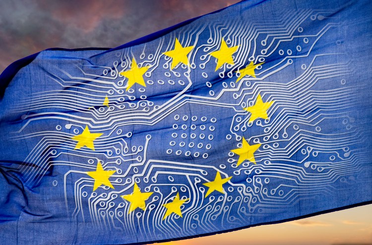 European flag with board in front of dramatic sky