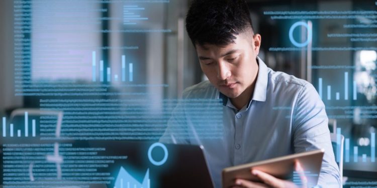 Business owner using AI to assist with tasks during period of employee turnover