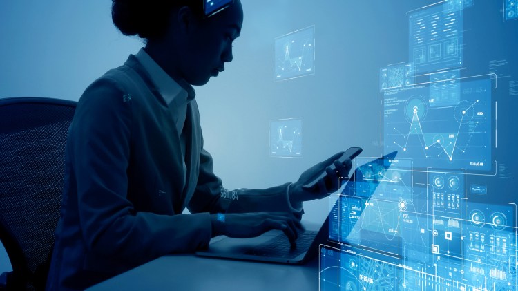 Person with laptop working with data