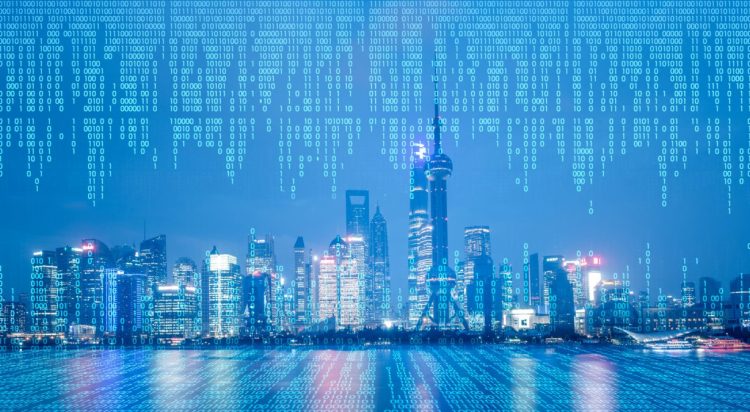 Cityscape with abstract data connected by a cloud network