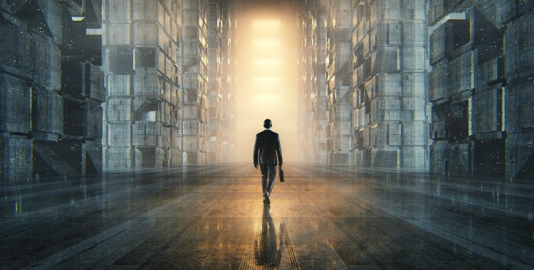 Businessman walking in dark futuristic city.