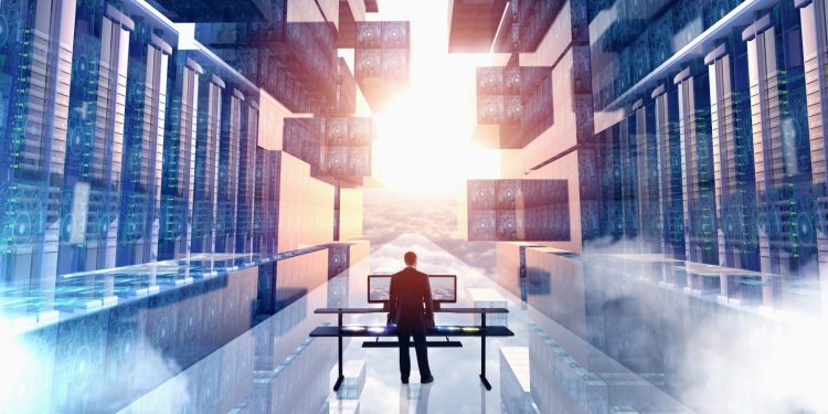 Businessman using computer in virtual server room
