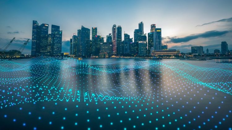 Cityscape connected by cloud network data particles.