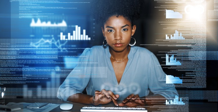 Shot of a programmer working on a computer code at night
